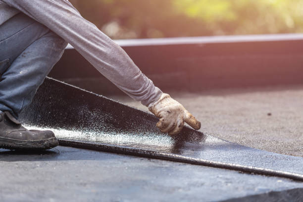Professional Waterproofing technician working in Asbury Park, NJ